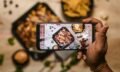 high-angle-view-person-holding-smart-phone-min